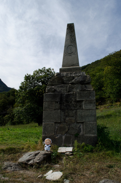 Posing in front of the monument at Sibaud